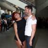Emmanuel Moire et la danseuse Fauve Hautot, de l'émission Danse avec les stars à l'aéroport de Roissy-Charles-de-Gaulle, le 12 juillet 2013.