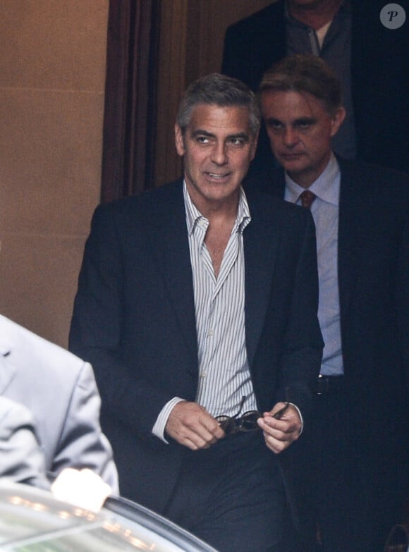 George Clooney sur les Champs-Elysées, le 16 juillet 2013.