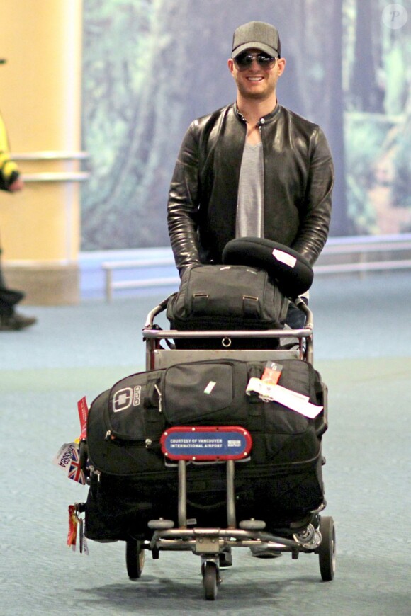 Michael Bublé à son arrivée à l'aéroport de Vancouver, le 22 juillet 2013.