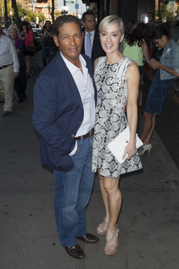 Bryant Gumbel et Hilary Quinlan à la première du film Elysium au Sunshine Landmark de New York, le 30 juillet 2013.