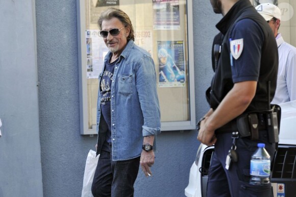 Johnny Hallyday pendant le dernier jour de tournage du film "Salaud, on t'aime" à Saint-Gervais-les-Bains, le 31 juillet 2013.