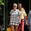 Heidi Klum quitte son hôtel en compagnie de son père Günther. New York, le 7 août 2013.