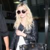 Ashlee Simpson et son petit ami Evan Ross arrivent à l'aéroport de Los Angeles, le 31 juillet 2013.