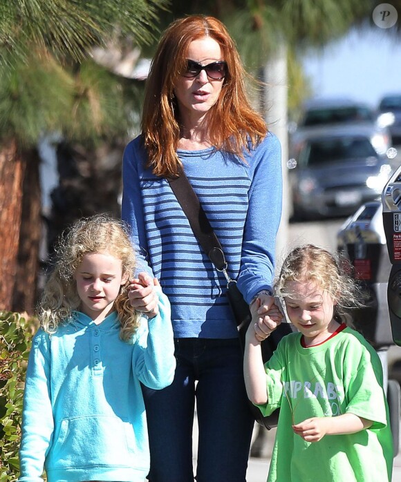 Marcia Cross de Desperate Housewives avec ses jumelles Eden et Savannah à Los Angeles, le 9 août 2013