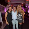 David Guetta et Cathy Guetta en compagnie du maître des lieux Patrick Tartary lors d'une soirée organisée au Gotha Club de Cannes, le 9 août 2013