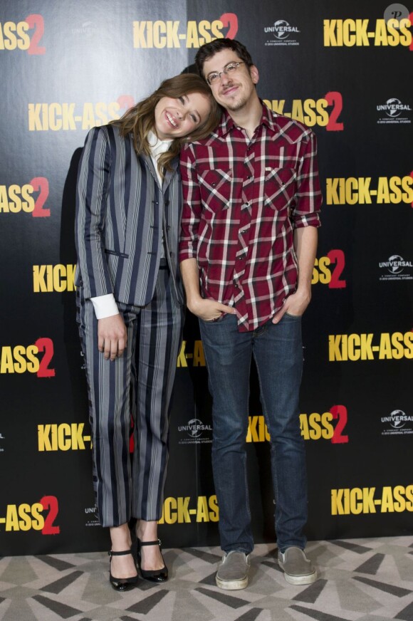 Chloë Grace Moretz et Christopher Mintz-Plasse lors d'un photocall du film "Kick-Ass 2" à Londres le 5 août 2013.