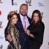 Triple H, Vanessa Hudgens et Stephanie McMahon à Beverly Hills, le 15 août 2013.