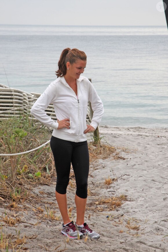 Agnieszka Radwanska pose près de la plage de Key Biscane à Miami le 19 mars 2013