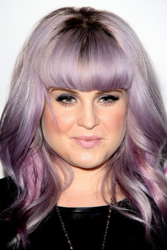 Kelly Osbourne pose lors de la soirée BeautyCon Summit, à Hollywood aux Siren Studios, Los Angeles, le 24 août 2013.