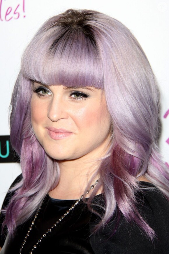 Kelly Osbourne pose lors de la soirée BeautyCon Summit, à Hollywood aux Siren Studios, Los Angeles, le 24 août 2013.