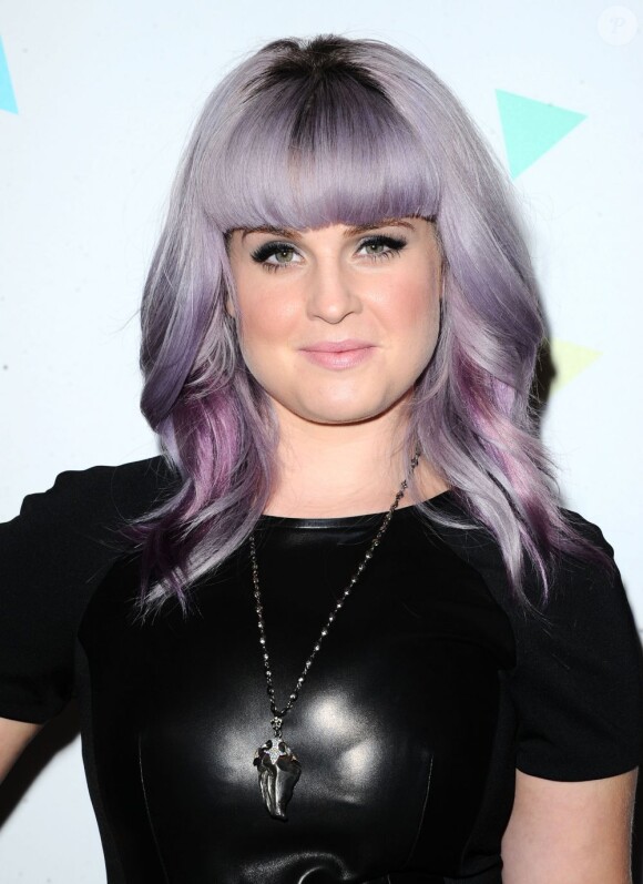 Kelly Osbourne pose lors de la soirée BeautyCon Summit, à Hollywood aux Siren Studios, Los Angeles, le 24 août 2013.