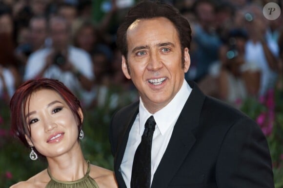 Nicolas Cage et sa femme Alice Kim Cage radieuse à la 70e Mostra de Venise, au Lido, le 30 août 2013.