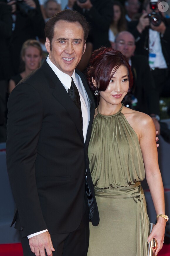 Nicolas Cage et sa femme Alice Kim Cage à la 70e Mostra de Venise, au Lido, le 30 août 2013.