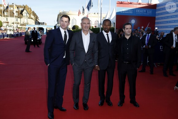 Channing Tatum, Roland Emmerich, Jamie Foxx et le producteur Brad Fischer lors du festival du cinéma américain de Deauville pour la présentation de White House Down le 1er septembre 2013