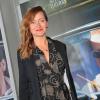 Julie Ferrier à la première du film 'Pour une Femme', au cinéma Publicis des Champs-Elysées, à Paris, le 24 juin 2013. La star participe à l'opération du PMU intitulée "Serial parieurs".