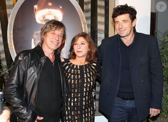 Jean-Louis Aubert, Patrick Bruel et Sarah Guetta à l'inauguration du nouveau salon de coiffure de Sarah Guetta, à Paris, le 12 septembre 2013.