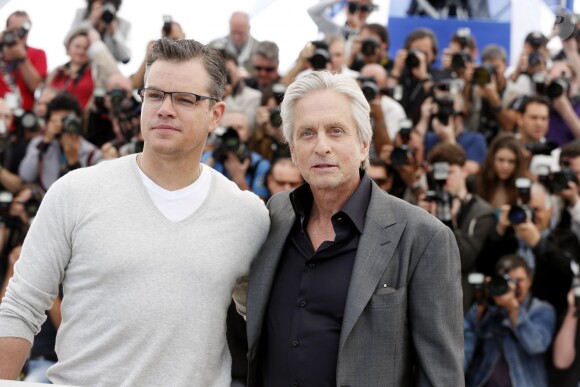 Matt Damon et Michael Douglas lors du photocall du film "Ma vie avec Liberace" au 66e Festival du Film de Cannes le 21 mai 2013.