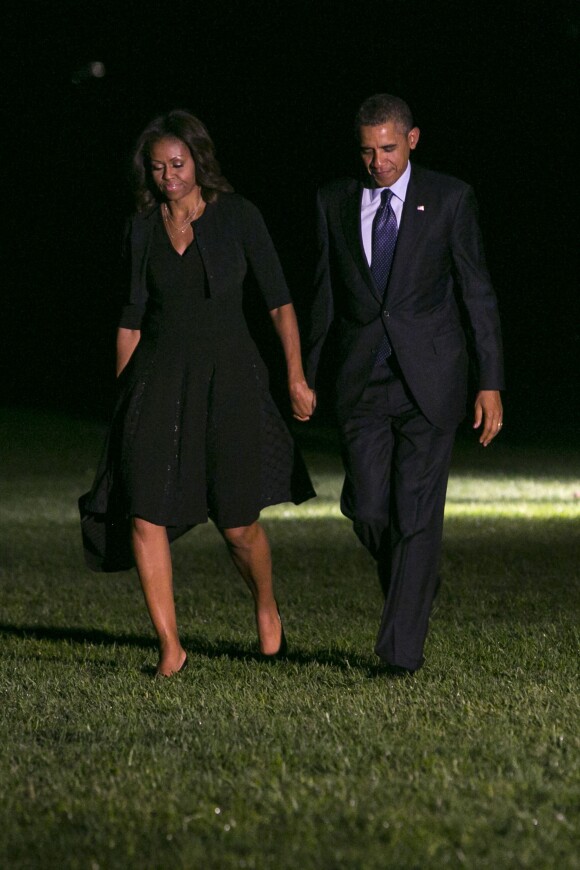 Barack et sa femme Michelle Obama rentrent à Washington, après avoir passé deux jours à New York, le 24 septembre 2013.