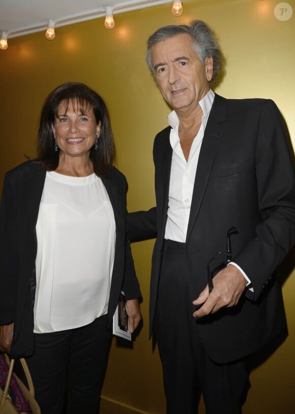 Anne Sinclair et Bernard-Henry Lévy lors de la première du film Opium au cinéma Le Saint-Germain à Paris, le 27 septembre 2013.