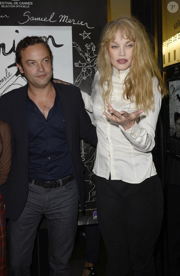 Patrick Mille et Arielle Dombasle lors de la première du film Opium au cinéma Le Saint-Germain à Paris, le 27 septembre 2013.