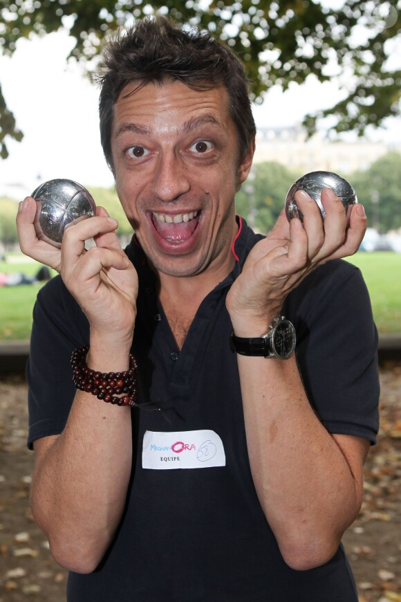 Benoît Chaigneau - Tournoi de pétanque organisé place des Invalides à Paris et dont les fonds ont été reversés à l'association Meghanora, seule association en Europe à aider la recherche concernant les tumeurs rénales de l'enfant. Le 29 septembre 2013. 