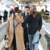 Exclusif - Kim Kardashian et Kanye West à l'aéroport de San Francisco, s'apprêtent à rejoindre Paris. Le 27 septembre 2013.
