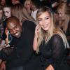 Kim Kardashian et Kanye West assistent au défilé Givenchy prêt-à-porter printemps-été 2014 à la Halle Freyssinet. Paris, le 29 septembre 2013.