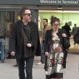 Tim Burton et Helena Bonham Carter arrivant à l'aéroport de Heathrow à Londres en provenance de Los Angeles, le 28 février 2013