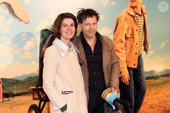 Irène Jacob et son mari Jéröme Kircher lors de la première du film L'Extravagant Voyage du jeune et prodigieux T. S. Spivet à Paris, le 8 octobre 2013.