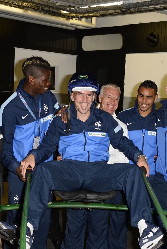 Paul Pogba, Franck Ribery et Didier Deschamps à l'hippodrome de Vincennes le 8 octobre 2013.