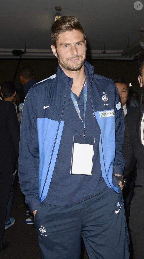 Olivier Giroud à l'hippodrome de Vincennes le 8 octobre 2013.