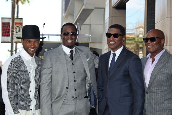 Usher, Sean 'P. Diddy' Combs et le producteur Antonio 'L.A.' Reid assistent à l'inauguration de l'étoile de Kenny 'Babyface' Edmonds sur le Hollywood Walk of Fame, à Los Angeles le 10 octobre 2013.
