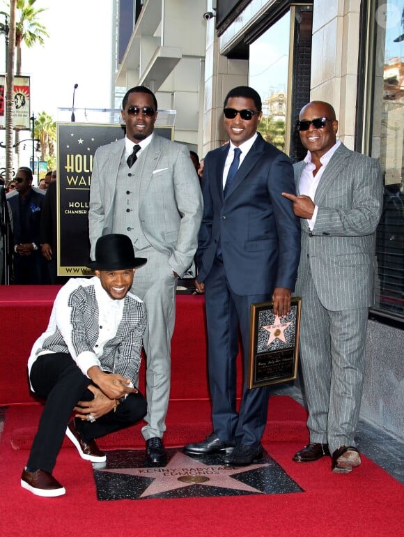 Usher, Sean 'P. Diddy' Combs et le producteur 'L.A.' Reid assistent à l'inauguration de l'étoile de Kenny 'Babyface' Edmonds sur le Hollywood Walk of Fame, à Los Angeles le 10 octobre 2013.