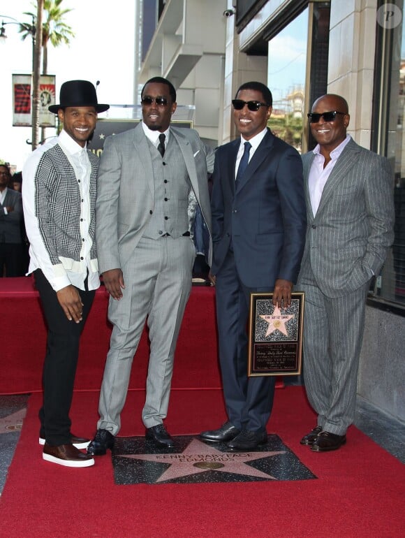 Usher, Sean 'P. Diddy' Combs et le producteur 'L.A.' Reid à l'inauguration de l'étoile de Kenny 'Babyface' Edmonds sur le Hollywood Walk of Fame, à Los Angeles le 10 octobre 2013.