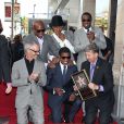 Le producteur 'L.A.' Reid, Usher, Sean 'P. Diddy' Combs, assistent à l'inauguration de l'étoile de Kenny 'Babyface' Edmonds sur le Hollywood Walk of Fame, à Los Angeles le 10 octobre 2013.