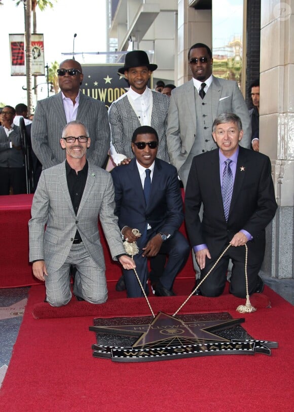 Le producteur 'L.A.' Reid, Usher, Sean 'P. Diddy' Combs assiste à l'inauguration de l'étoile de Kenny 'Babyface' Edmonds sur le Hollywood Walk of Fame, à Los Angeles le 10 octobre 2013.