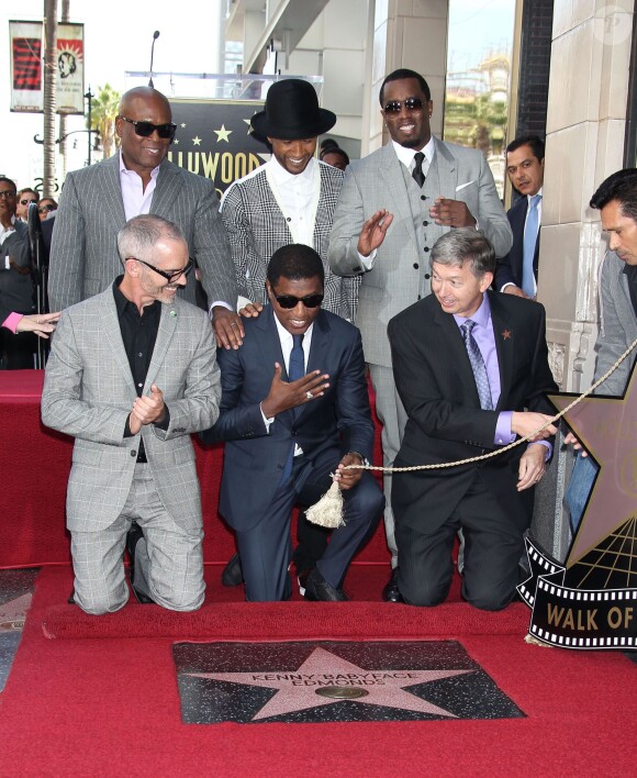 Usher, L.A. Reid, Sean 'P. Diddy' Combs assistent à l'inauguration de l'étoile de Kenny 'Babyface' Edmonds sur le Hollywood Walk of Fame, à Los Angeles le 10 octobre 2013.