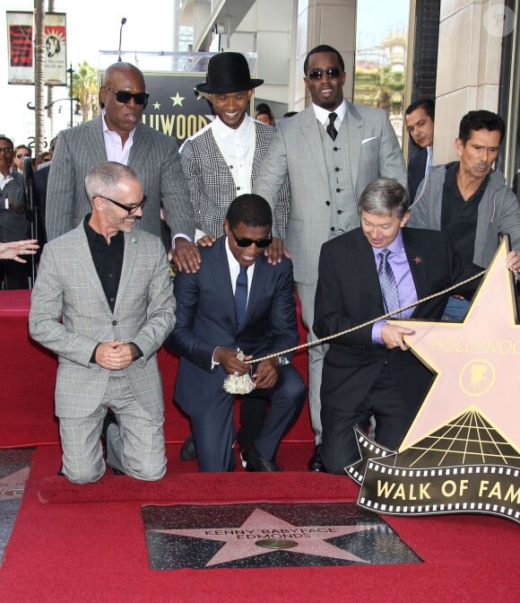 Usher, L.A. Reid, Sean 'P. Diddy' Combs assiste à l'inauguration de l'étoile de Kenny 'Babyface' Edmonds sur le Hollywood Walk of Fame, à Los Angeles le 10 octobre 2013.