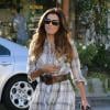 Eva Longoria sort de son salon de coiffure à Los Angeles avec un joli brushing. Le 17 octobre 2013