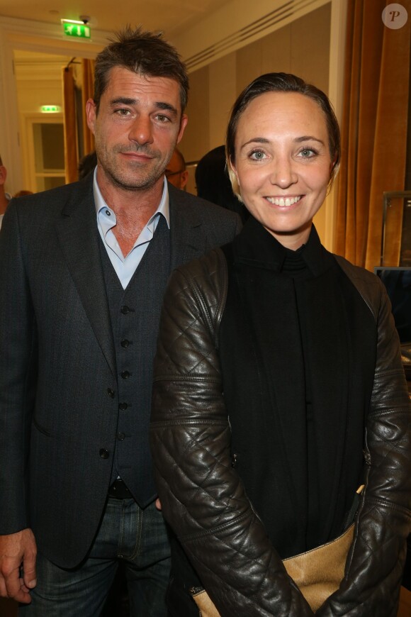 Thierry Neuvic et une amie à la soirée Jaeger-LeCoultre organisée à Paris Place Vendôme pour le premier anniversaire de la nouvelle boutique de la maison. Le 17 octobre 2013