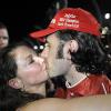 Dario Franchitti embrasse sa femme Ashley Judd après la course de Miami le 2 ocotbre 2010