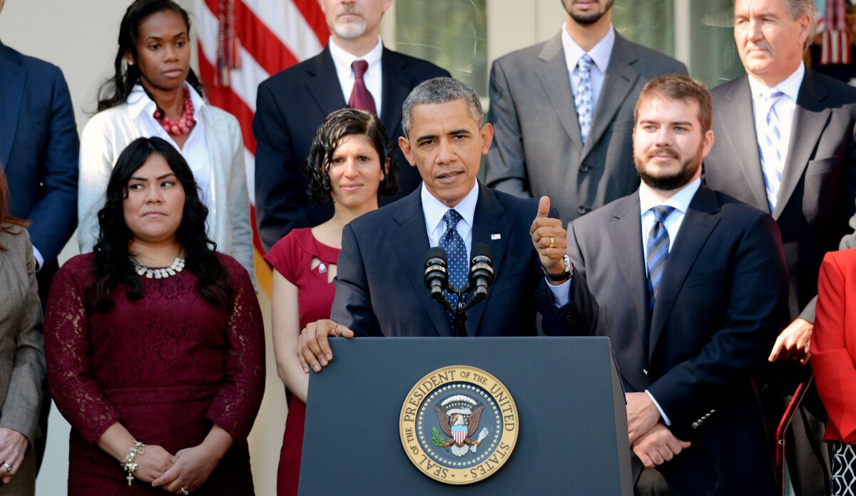 Photo : Barack Obama lors d'un discours à la Maison Blanche sur la loi ...