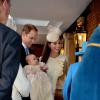 Le prince William et la duchesse de Cambridge célébraient dans l'intimité le baptême de leur fils le prince George de Cambridge, 3 mois, le 23 octobre 2013 au palais Saint James, à Londres.