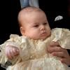 Le prince George de Cambridge, trois mois et un jour, au palais Saint James lors de son baptême le 23 octobre 2013