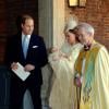 L'archevêque de Canterbury accueille le prince William et Kate Middleton avec le prince George pour son baptême le 23 octobre 2013 au palais Saint James, à Londres.