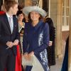 Carole Middleton à la sortie de la chapelle royale au baptême du prince George de Cambridge, 3 mois, le 23 octobre 2013 au palais Saint James, à Londres.