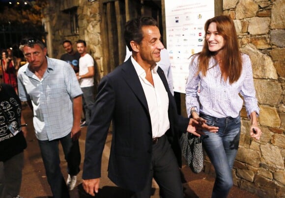 Nicolas Sarkozy et Carla Bruni-Sarkozy au concert de leur ami Julien Clerc au festival de Ramatuelle, le 3 août 2013.