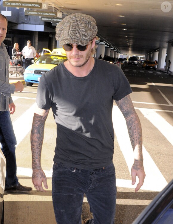 David Beckham seen at LAX international airport in Los Angeles, CA, USA on October 12, 2013. Photo by Xposure/ABACAPRESS.COM13/10/2013 - Los Angeles