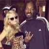 Paris Hilton a enchaîné les looks pour Halloween 2013, ici avec Snoop Dogg.