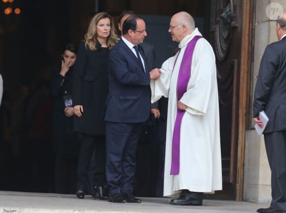 Valerie Trierweiler et Francois Hollande lors des obsèques de Patrice Chéreau en l'église Saint-Sulpice à Paris le 16 octobre 2013
